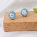 The new S925 sterling silver donut earrings are high-end and cool, with a cool and cool feel. Blue zircon sparkling diamond earrings are fashionable, versatile, and personalized